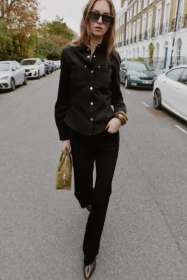 Брюки с завышенной талией и расклешенным штаниной- Заказать в России