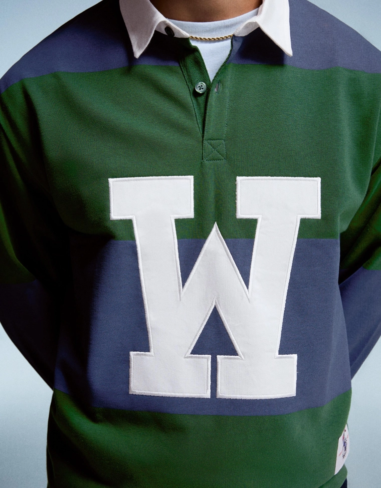 Поло геометрического кроя с длинными рукавами в полоску