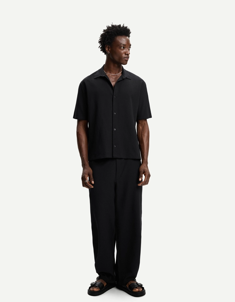 Джоггеры свободного кроя из плиссированной ткани