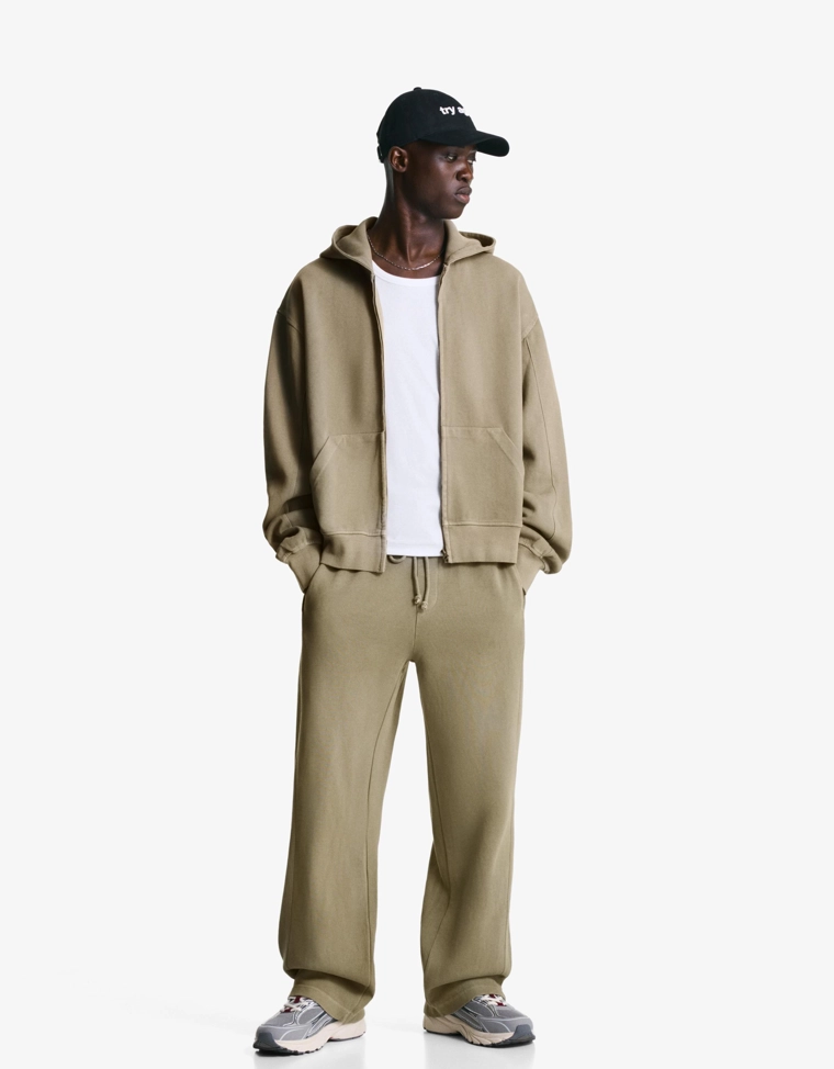 Брюки из ткани пике с эффектом потертости