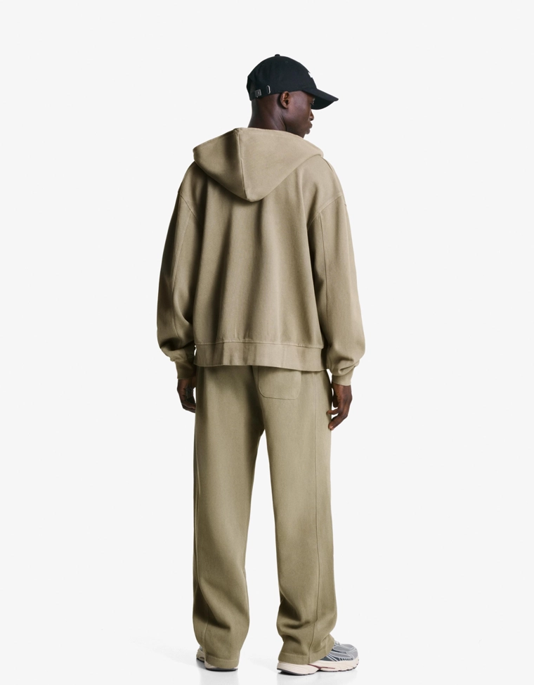 Брюки из ткани пике с эффектом потертости