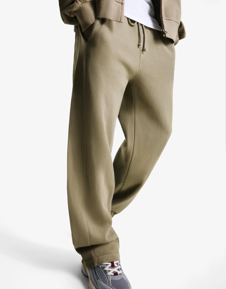 Брюки из ткани пике с эффектом потертости