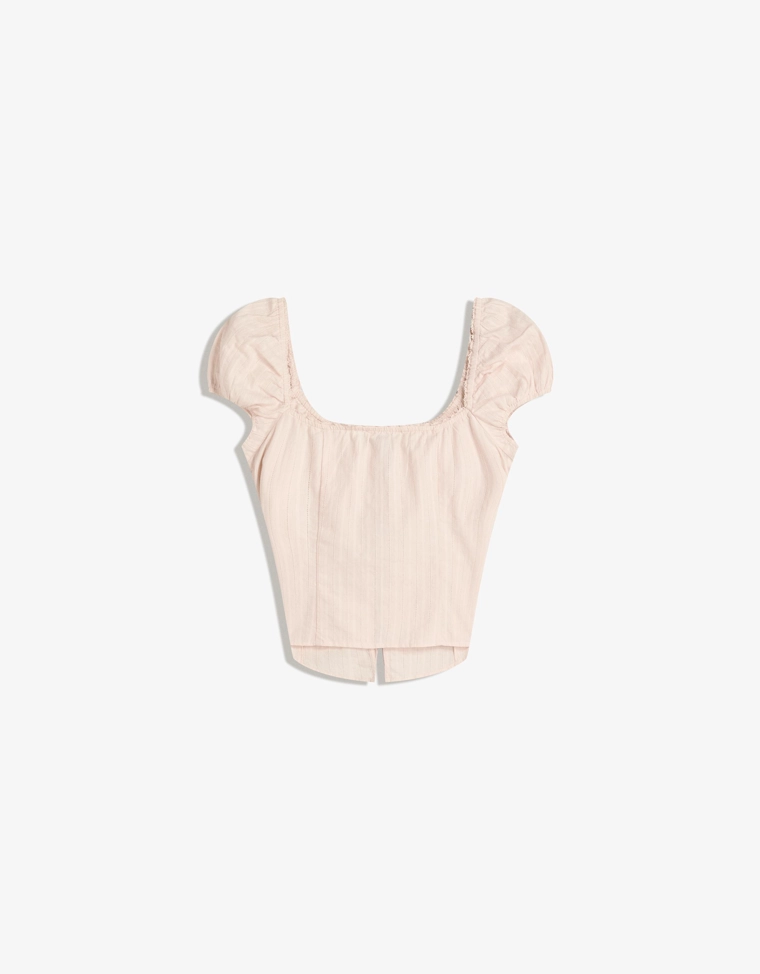 Блуза из рельефной ткани с короткими рукавами и завязками