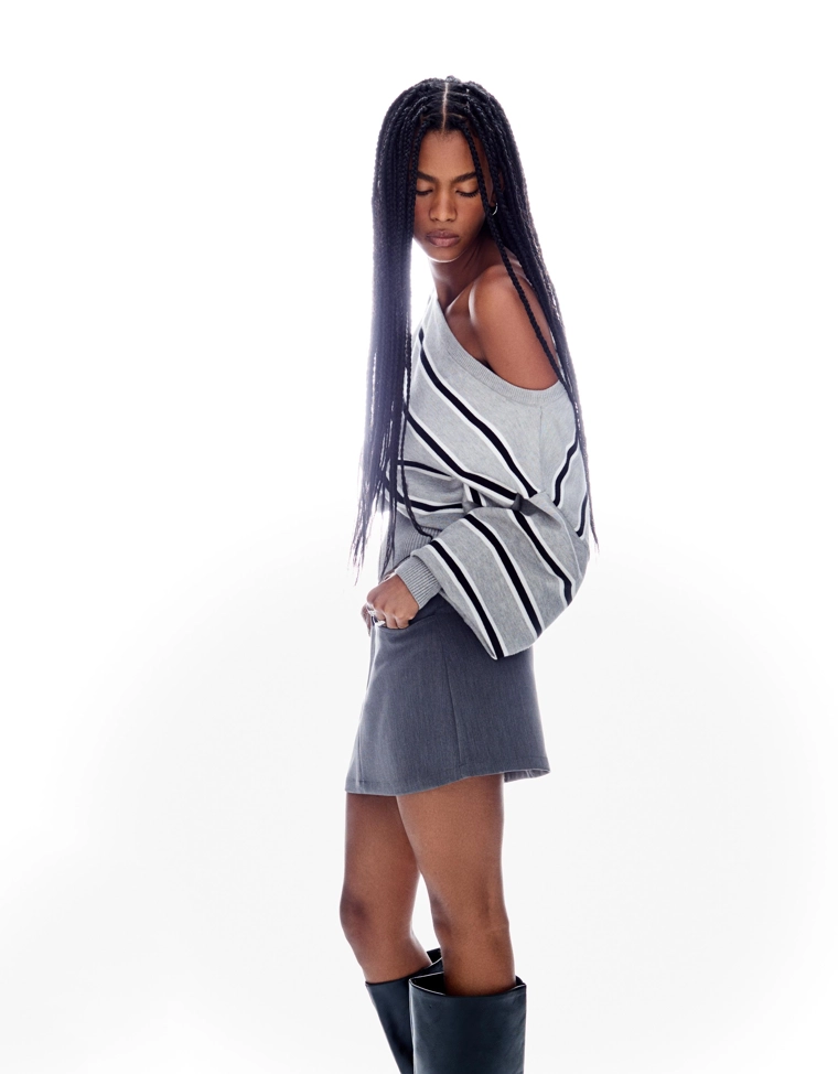 Асимметричный свитер с низом в рубчик