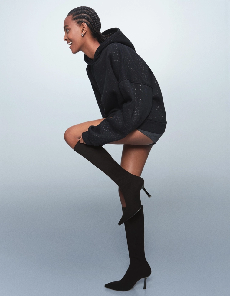 Эластичные сапоги на каблуке