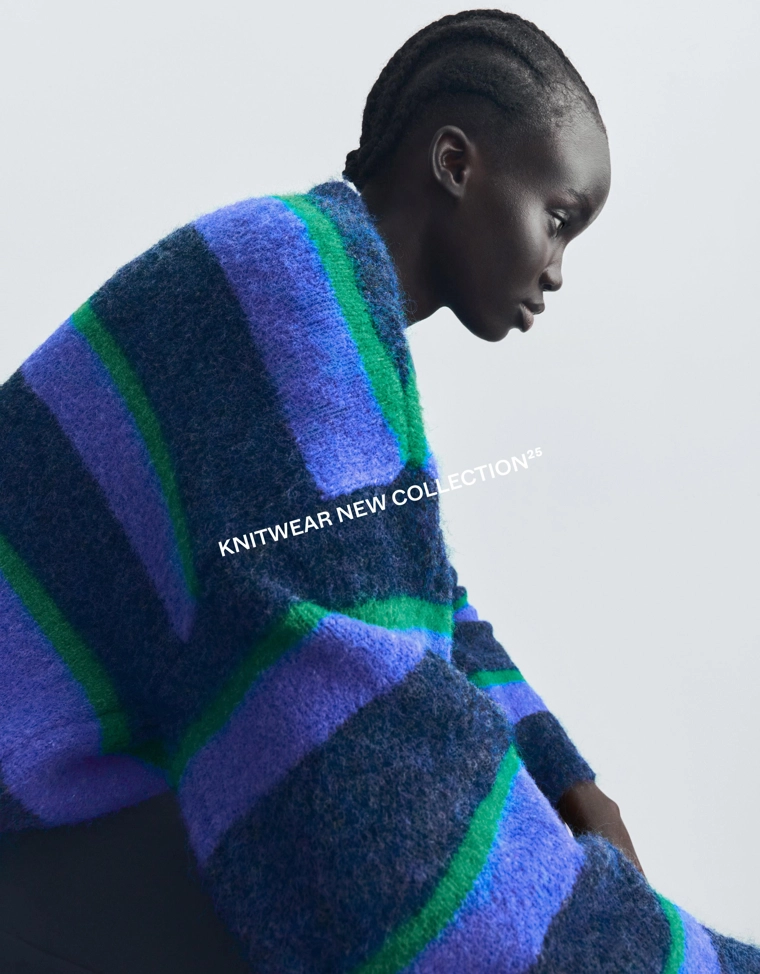 Свитер в разноцветную полоску