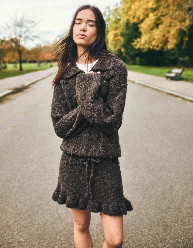 Мини-юбка с воланом и бантом