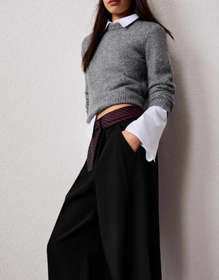 Черный пуховик с объемным ворсом