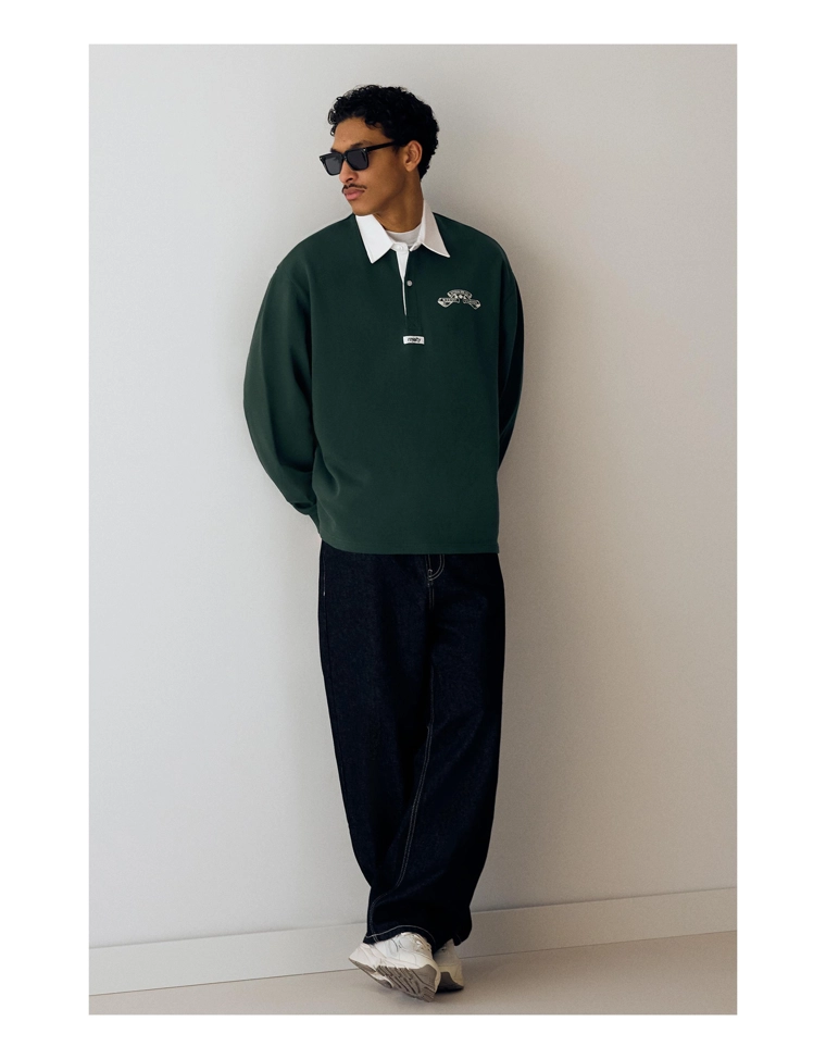 Поло геометрического кроя с длинными рукавами