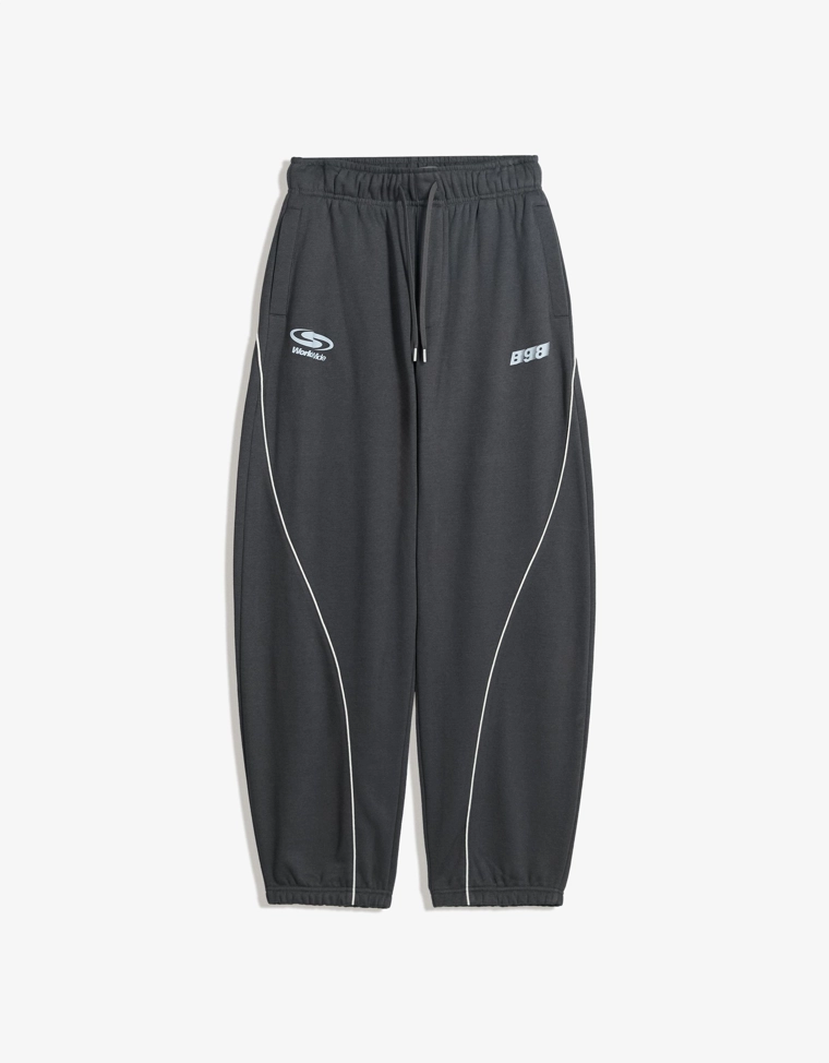 Брюки-бананы из ткани с принтом