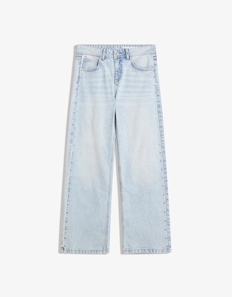 Джинсы свободного кроя с заклёпками-звёздами