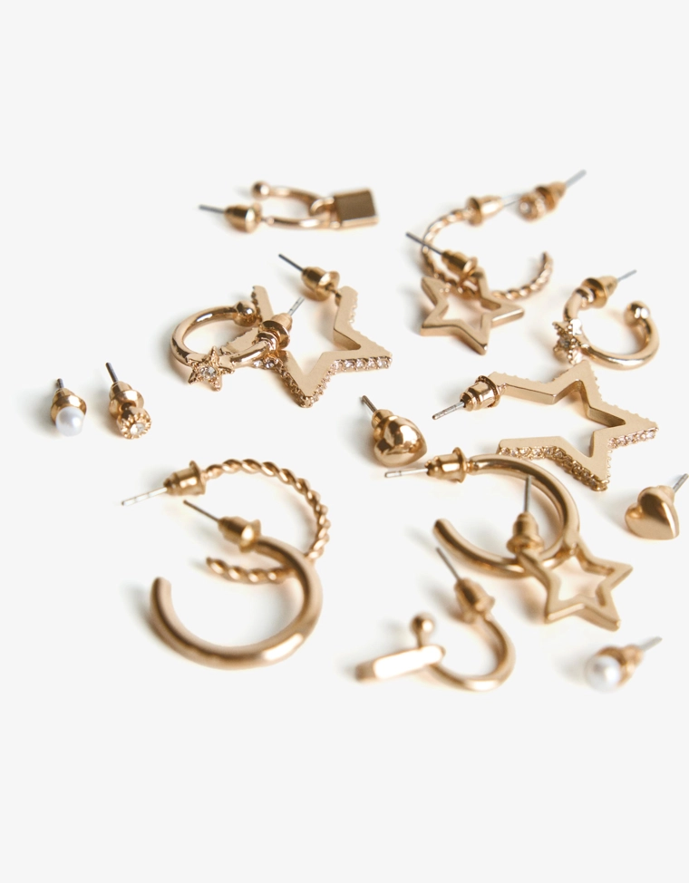 Набор из девяти пар серег со звездами