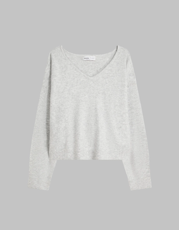 Свитер с V-образным вырезом и мягким прикосновением