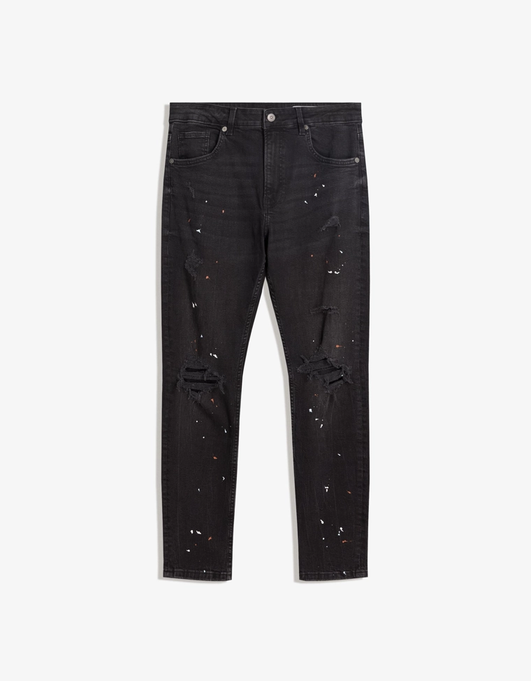 Рваные джинсы