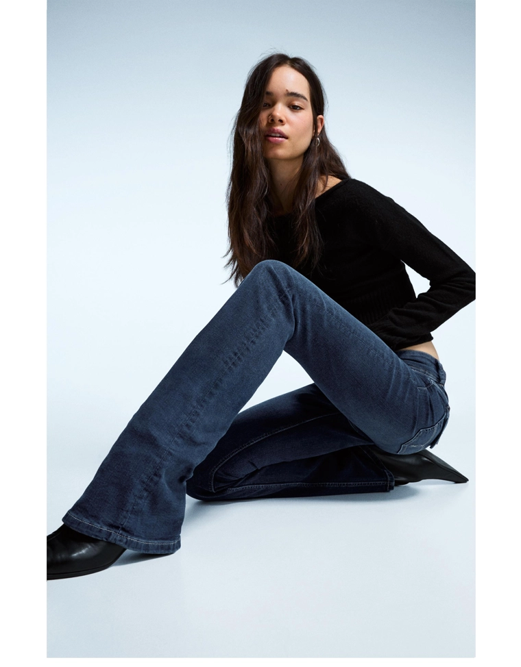 Джинсы bootcut с клапанами