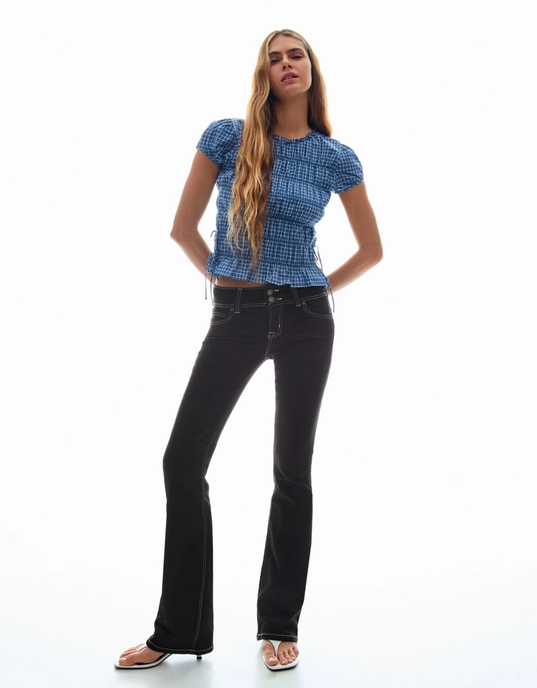 Джинсы bootcut с клапанами