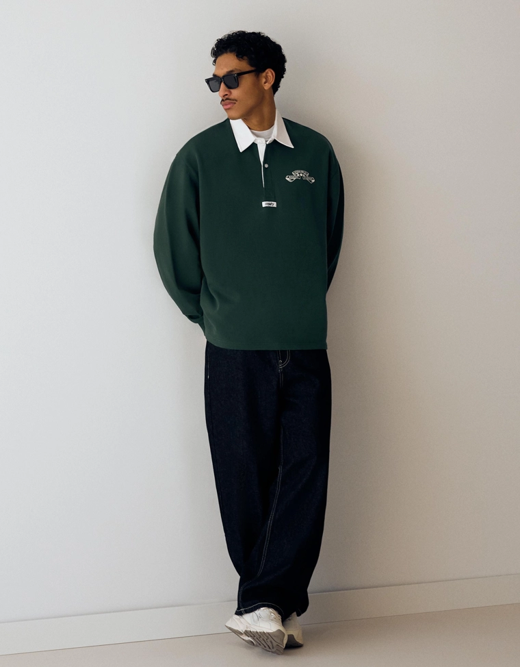 Поло геометрического кроя с длинными рукавами