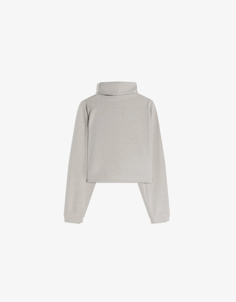 Свитер в рубчик с высоким воротником