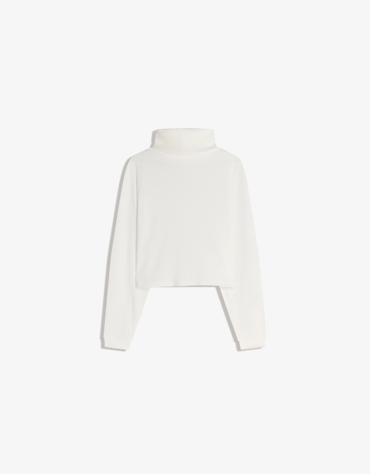 Свитер в рубчик с высоким воротником