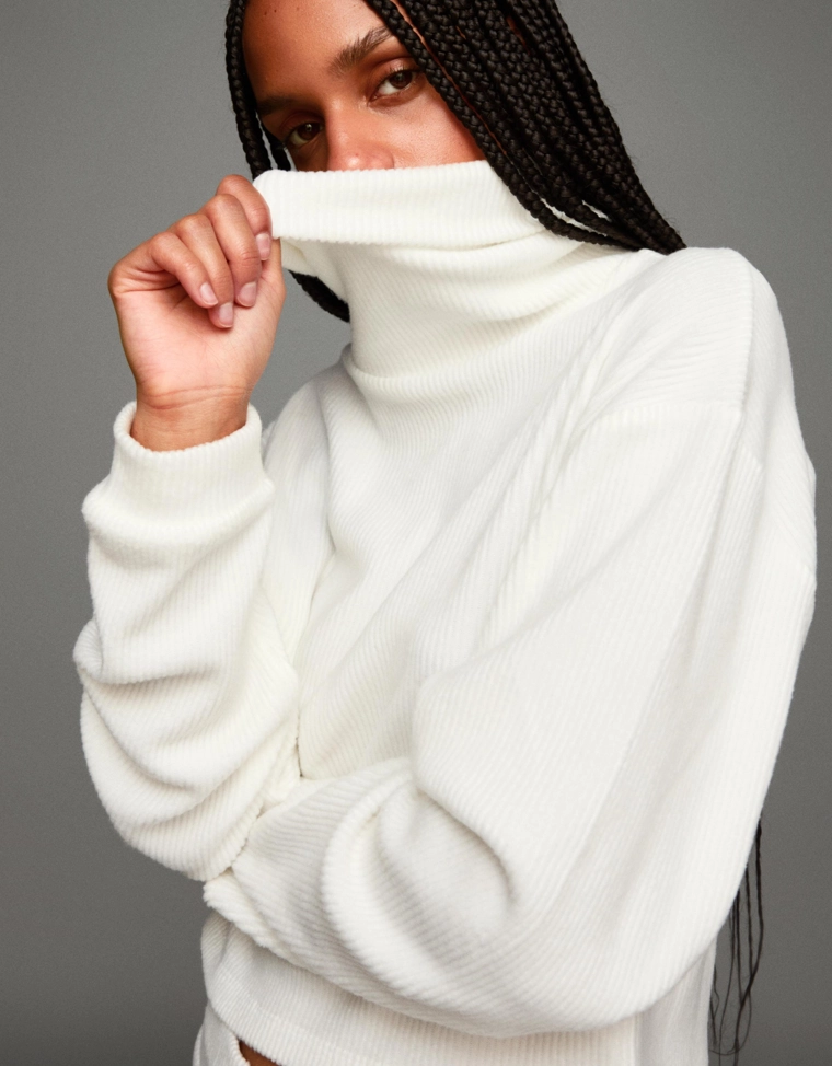 Свитер в рубчик с высоким воротником