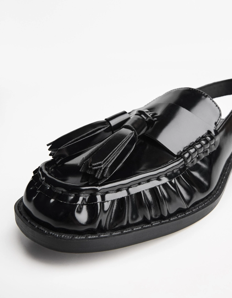 Лоферы с кисточками