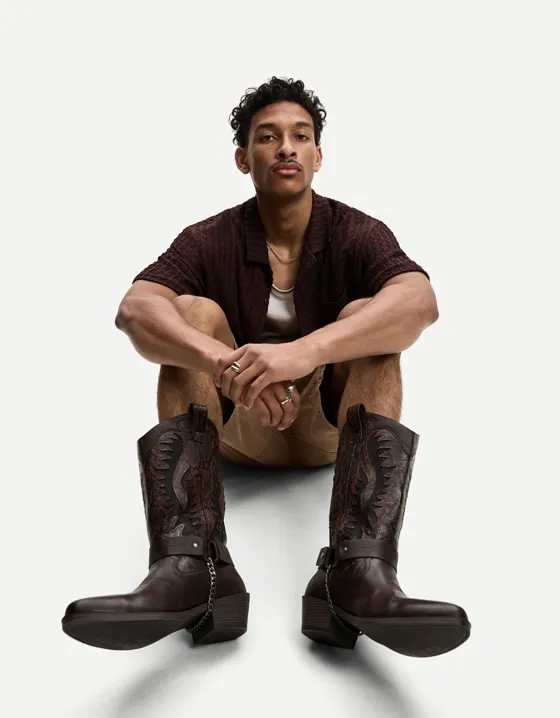 Сапоги в ковбойском стиле с анималистическим тиснением