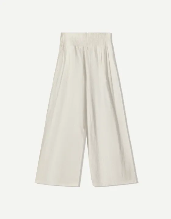 Брюки в стиле рустик с широкими штанинами и защипами