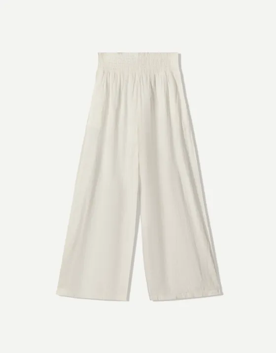 Брюки в стиле рустик с широкими штанинами и защипами