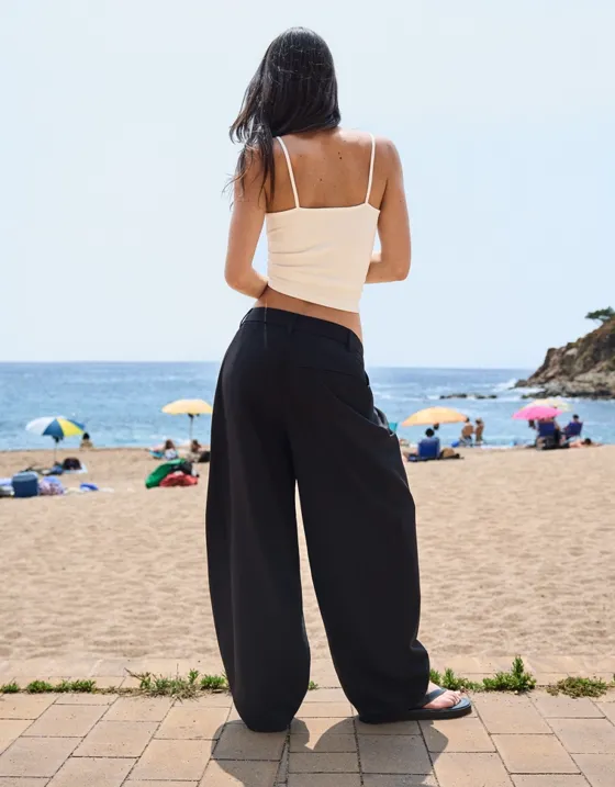 Брюки с поясом на запахе