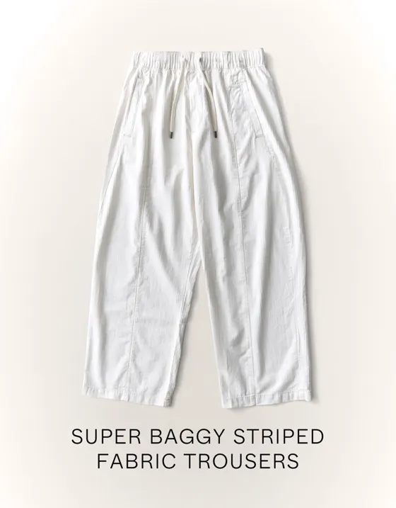 Брюки объемного свободного кроя в полоску