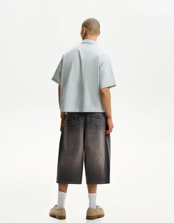 Джинсовые шорты объемного свободного кроя