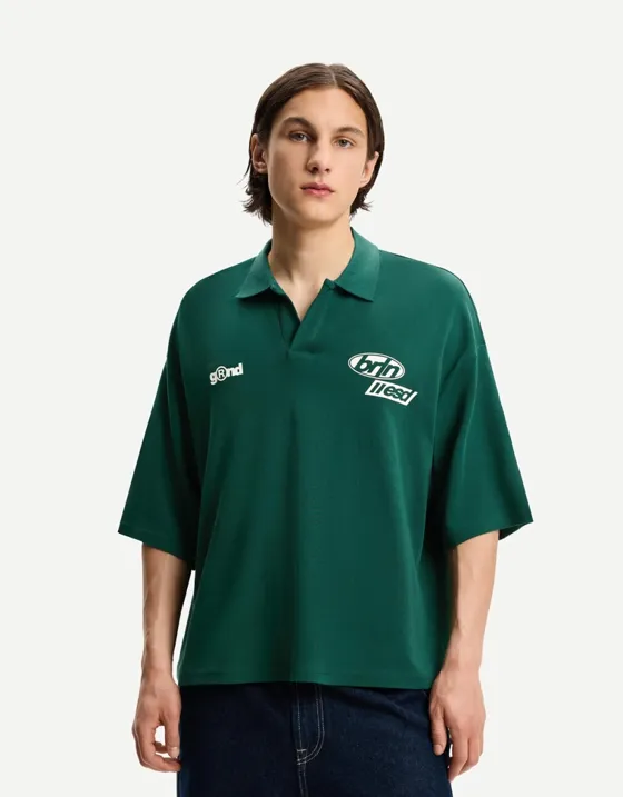 Поло оверсайз с короткими рукавами и принтом