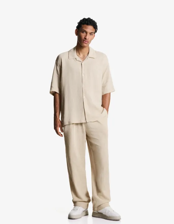 Брюки из крепа с широкими штанинами