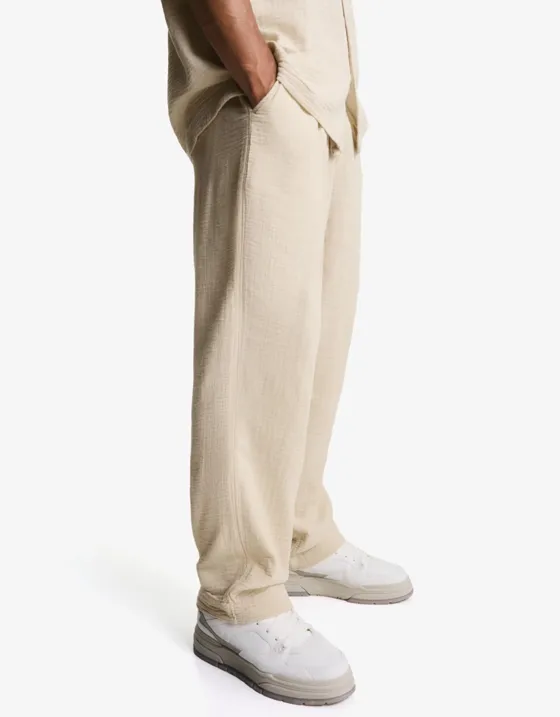 Брюки из крепа с широкими штанинами