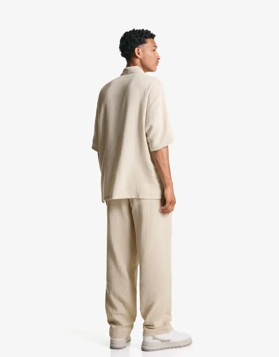 Брюки из крепа с широкими штанинами