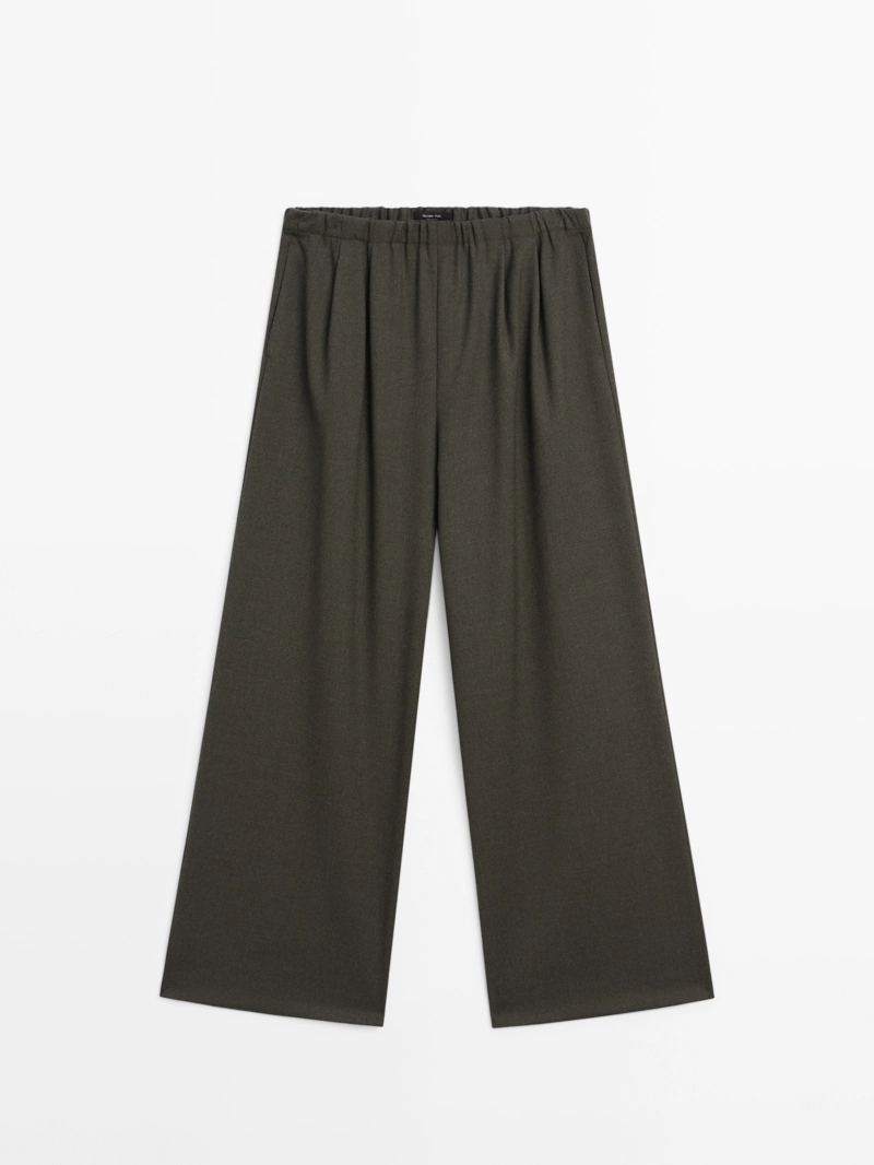 Широкие брюки с ластиком и защипами