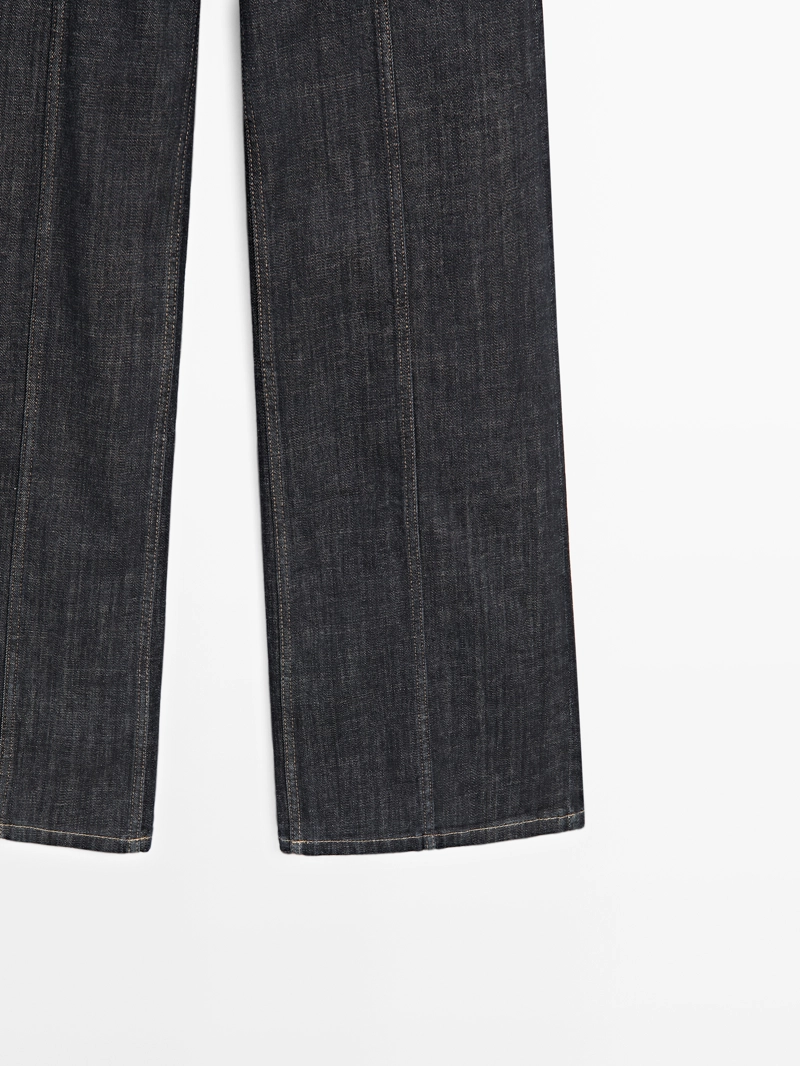 Джинсы с высокой талией и широкими брючинами с цепями