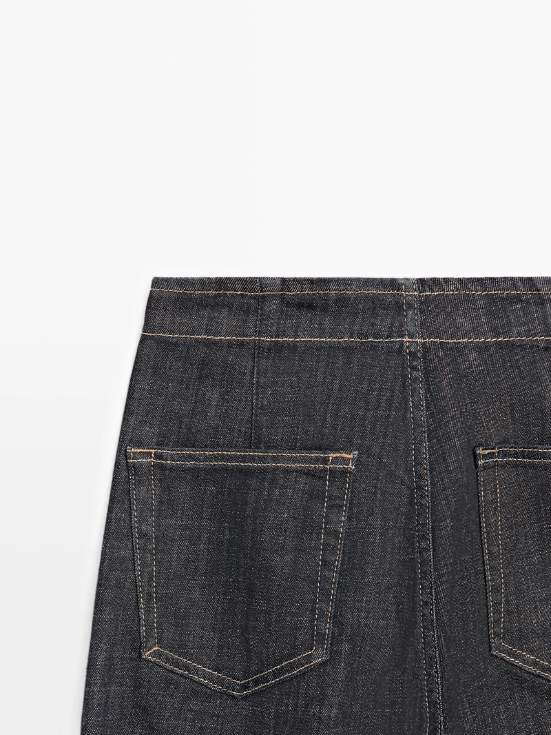 Джинсы с высокой талией и широкими брючинами с цепями