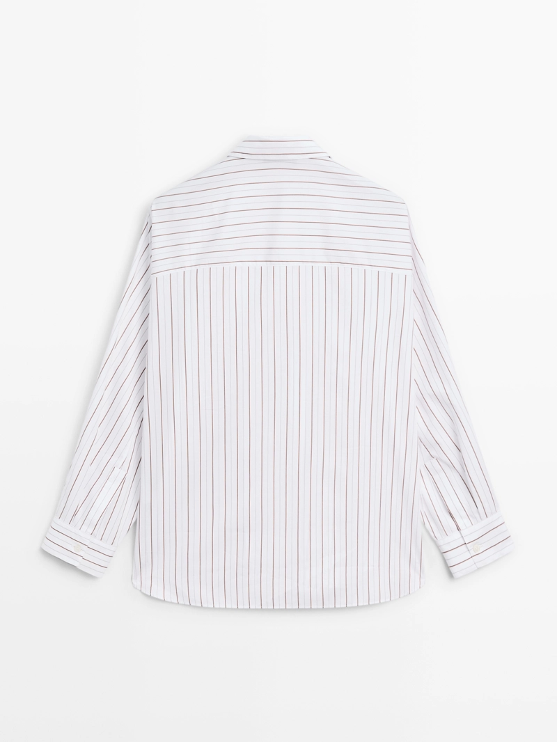 Рубашка в полоску свободного кроя