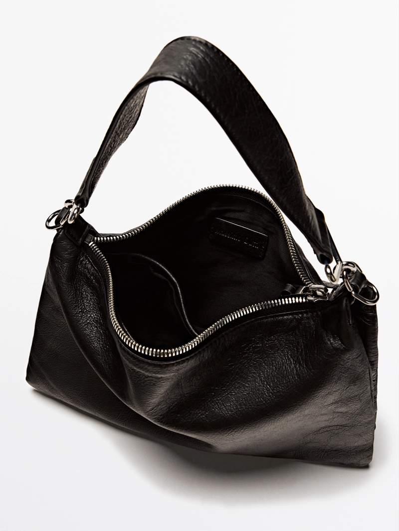 Небольшая кожаная сумка с отделениями