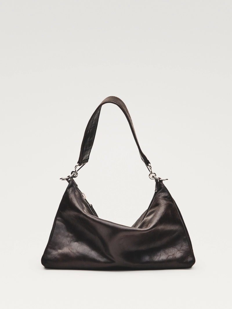 Сумочка из кожи с отделениями