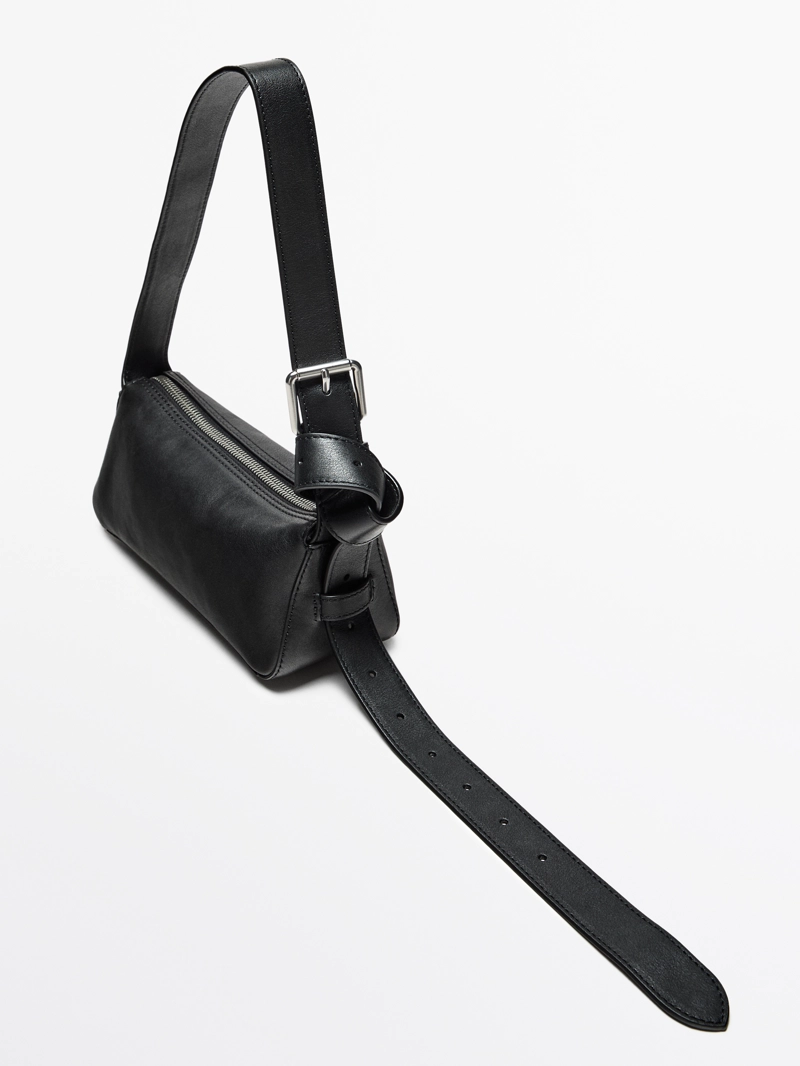 Сумка из натуральной кожи неплохого качества с пряжкой