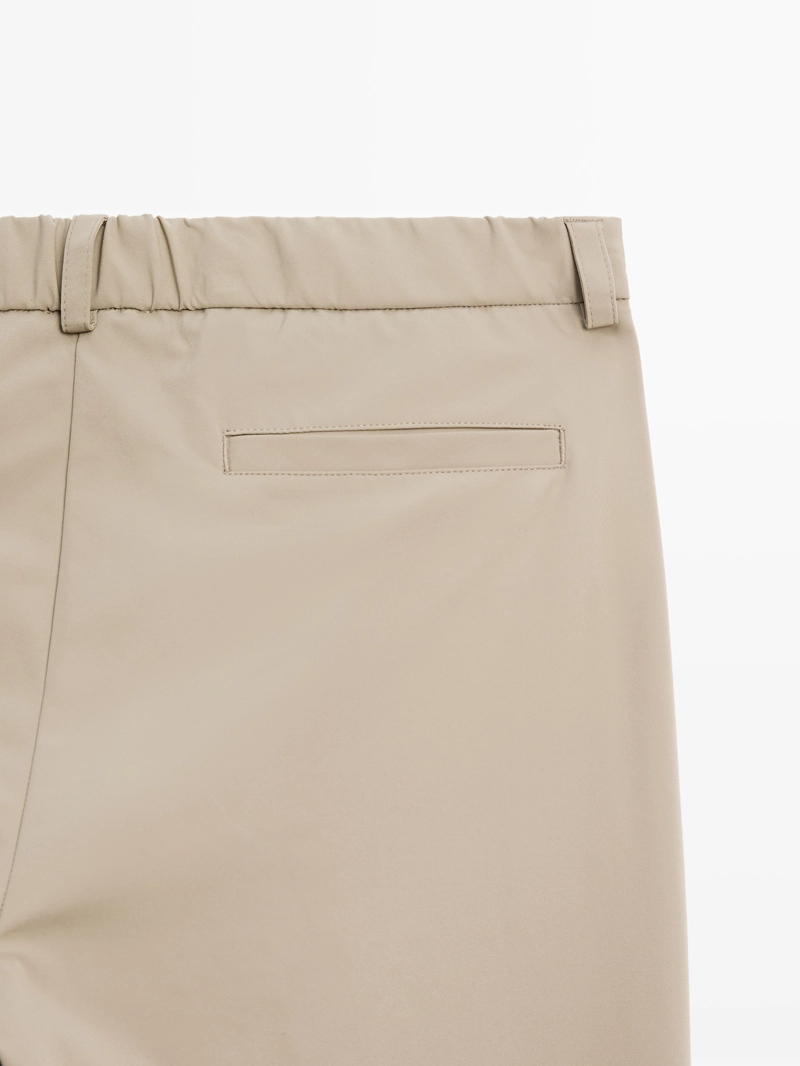 Брюки с широкими линиями regular-fit из технической ткани