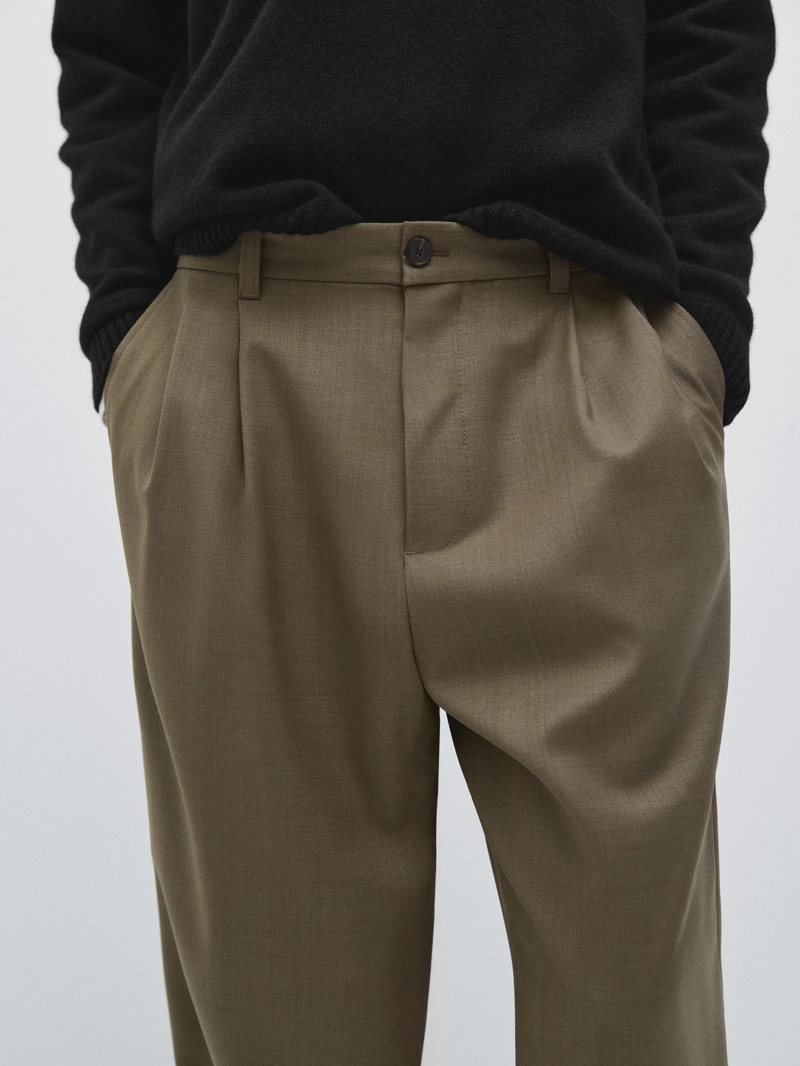 Брюки свободного кроя из шерстяной смеси с защипами