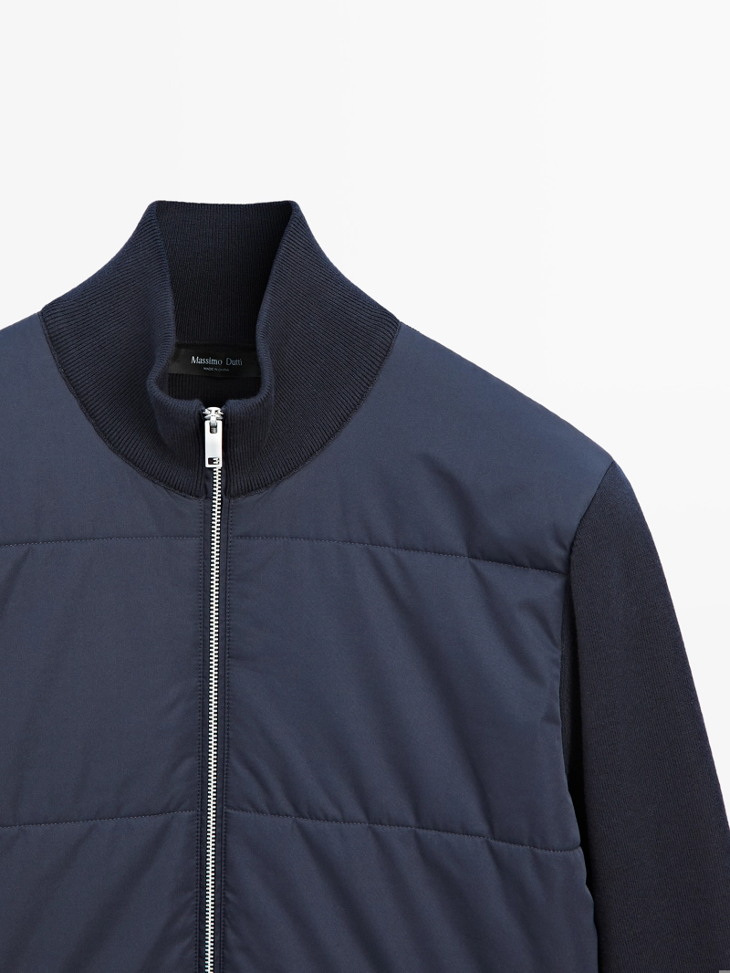 Куртка-пуховик с контрастным вязаным рукавом