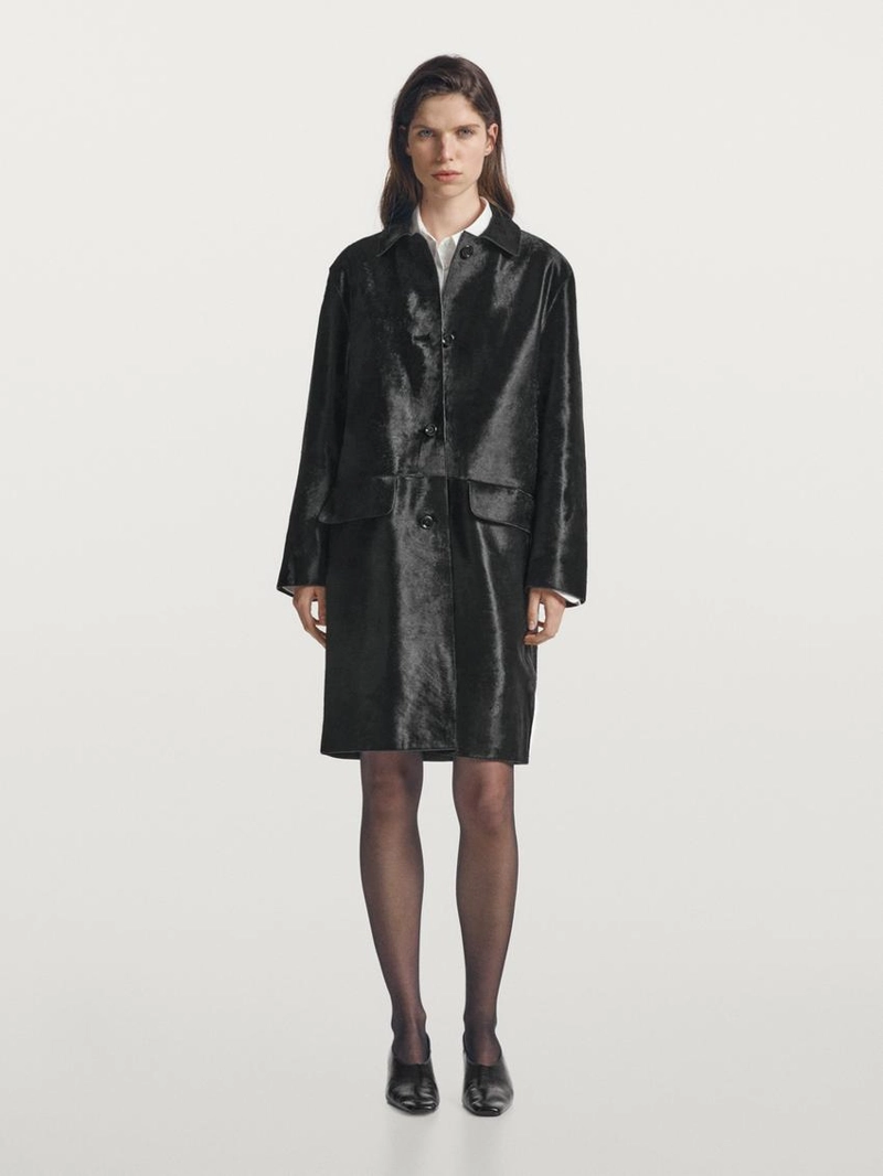 Длинное меховое пальто с отделкой из меха