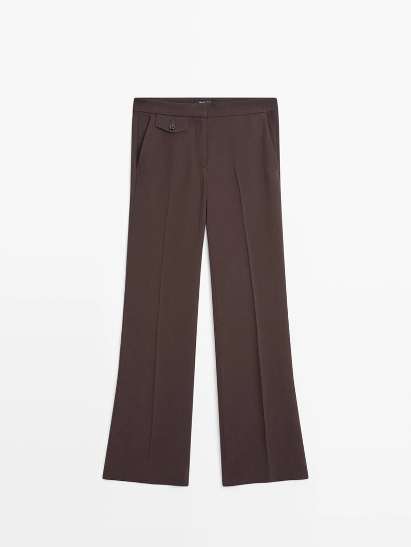 Брюки с карманами и расклешенным кроем