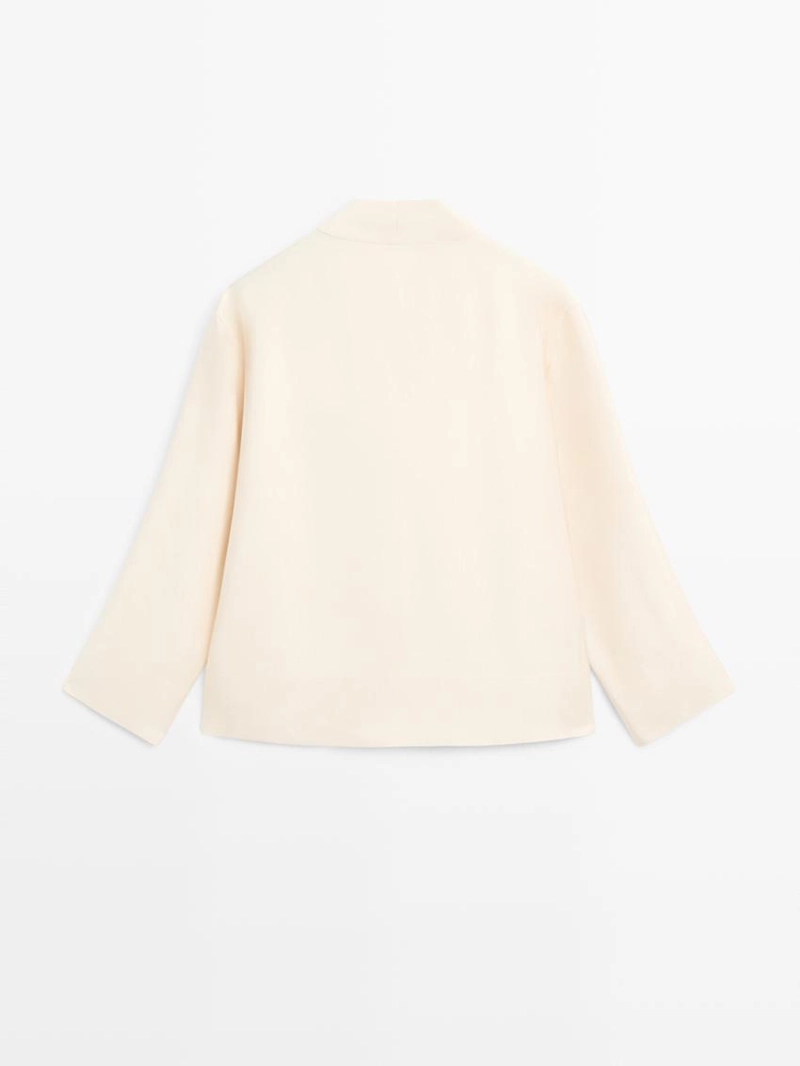 Блузка с биб-деталями