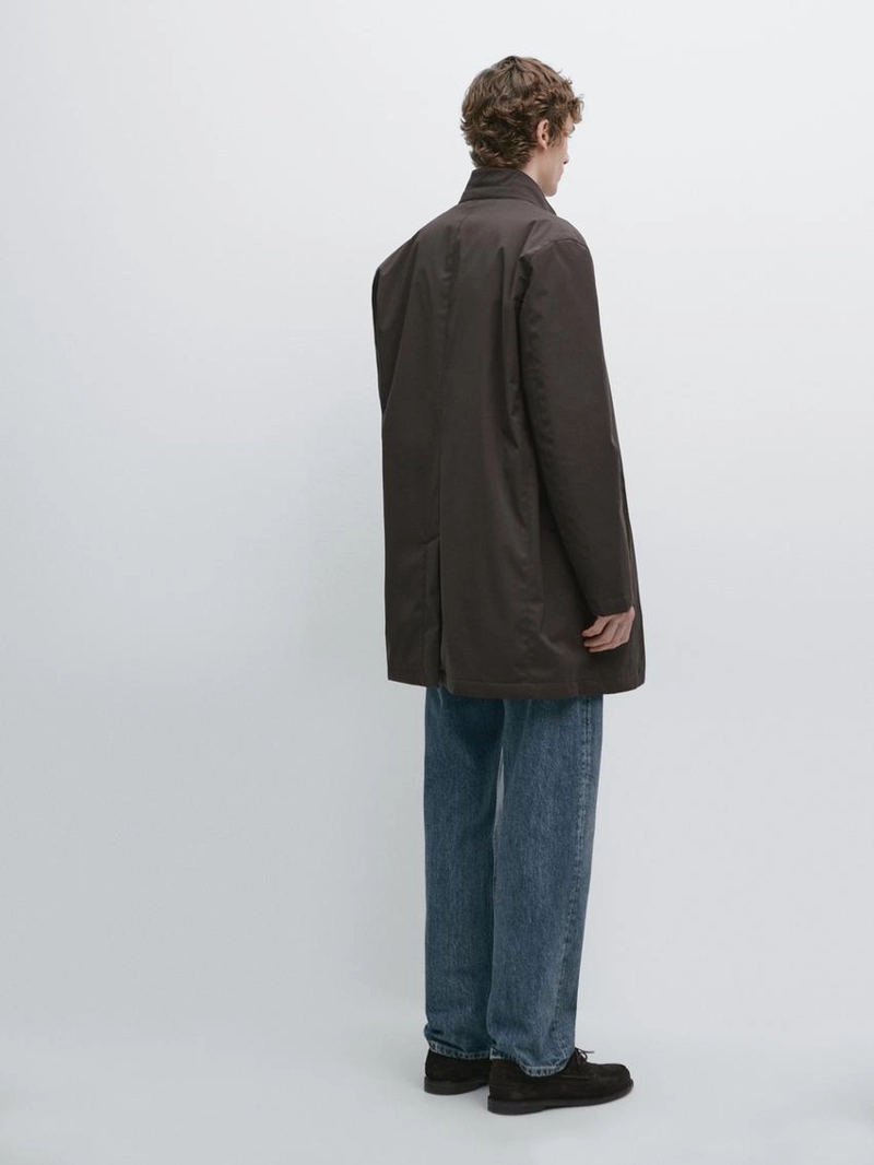 Полуприталенный пуховик с водоотталкивающей отделкой до середины бедра