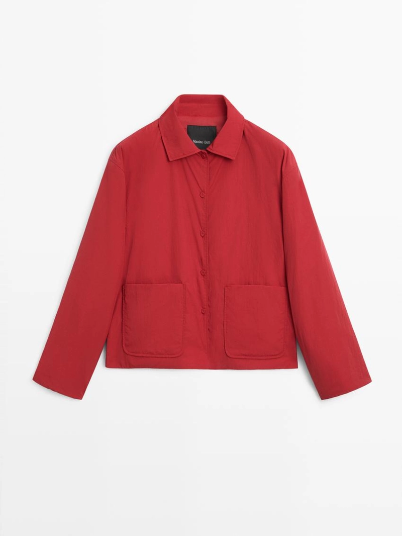 Короткая пуховая куртка с карманом